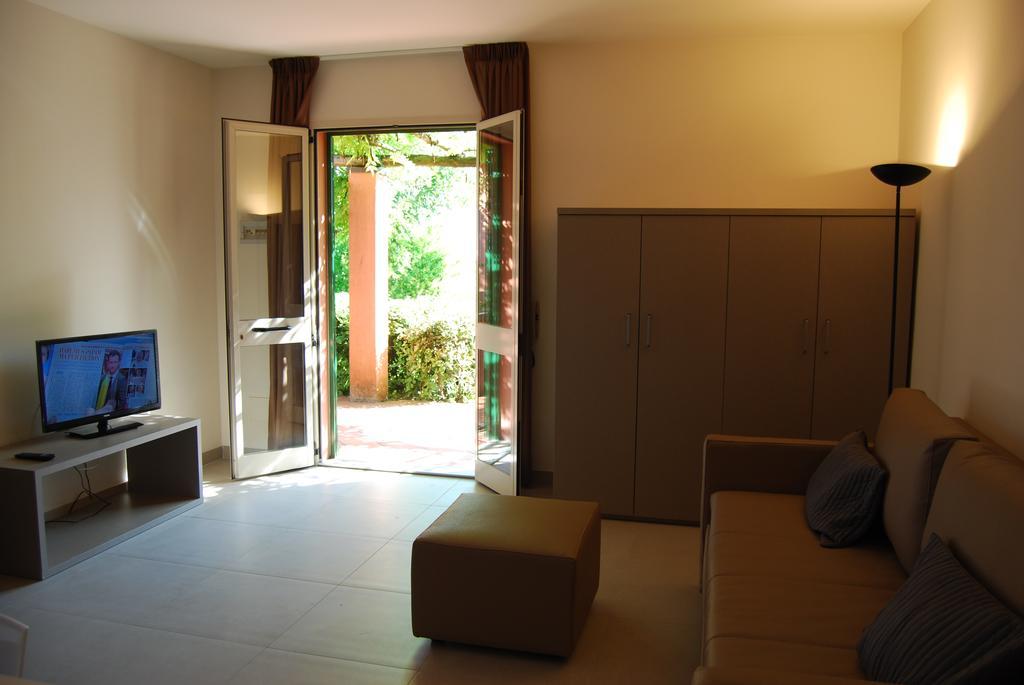 리치오네 Residenze Al Colle Dei Pini 아파트 호텔 객실 사진