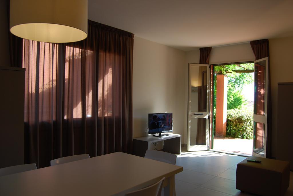 리치오네 Residenze Al Colle Dei Pini 아파트 호텔 객실 사진