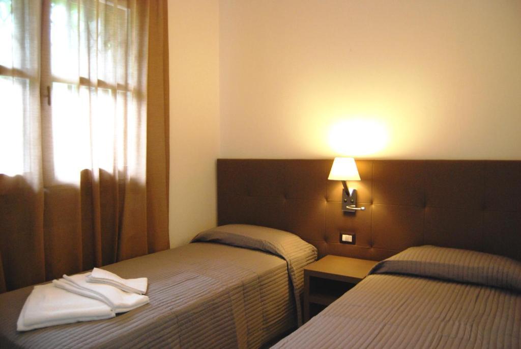 리치오네 Residenze Al Colle Dei Pini 아파트 호텔 객실 사진